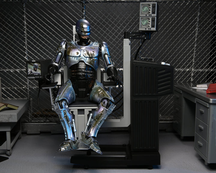 NECA Robocop 7” Scale Ultimate Battle Damaged RoboCop with Chair Action Figure