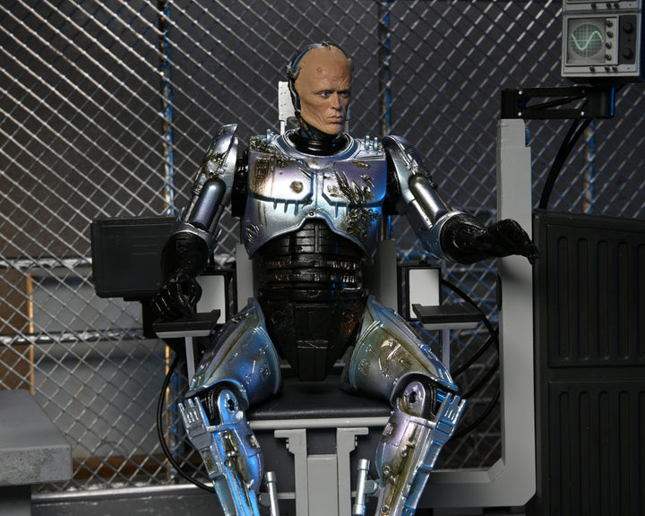 NECA Robocop 7” Scale Ultimate Battle Damaged RoboCop with Chair Action Figure