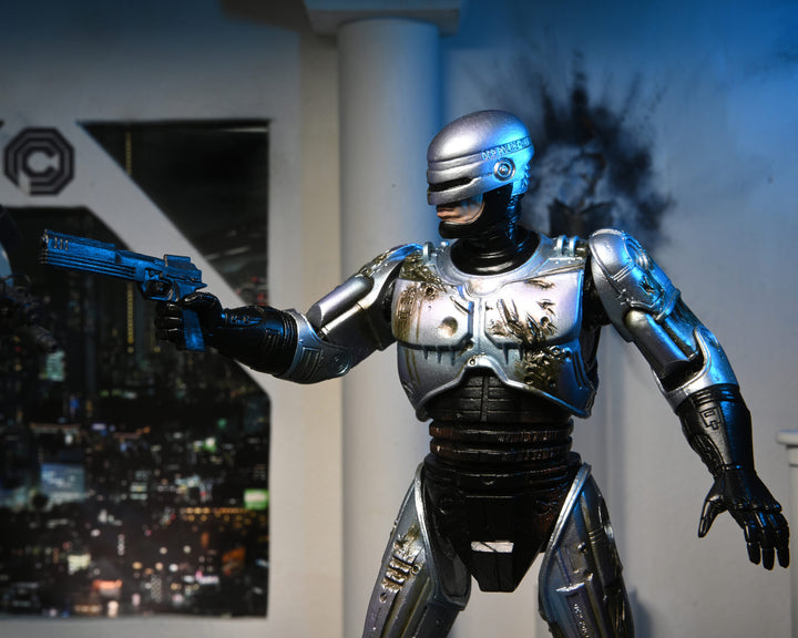 NECA Robocop 7” Scale Ultimate Battle Damaged RoboCop with Chair Action Figure