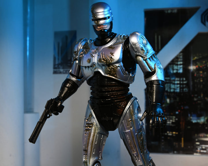 NECA Robocop 7” Scale Ultimate Battle Damaged RoboCop with Chair Action Figure