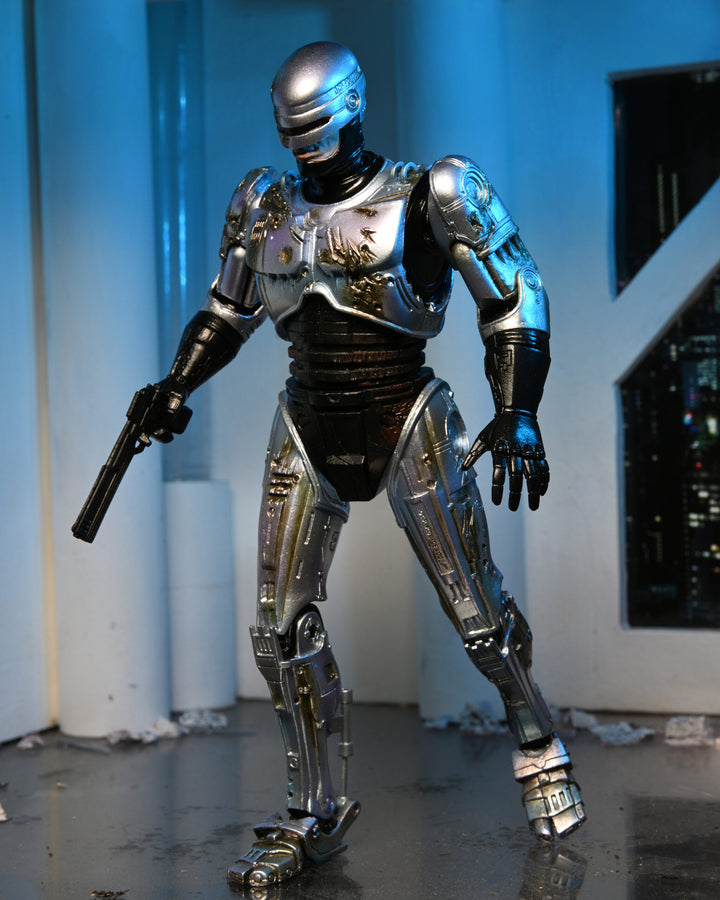NECA Robocop 7” Scale Ultimate Battle Damaged RoboCop with Chair Action Figure