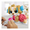 Play-Doh Care 'n Carry Vet Playset with toy dog and tools side angle