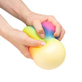 Scrunchems Super Rainbow ball squeezed