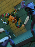 TMNT Cartoon Raphael (VHS) Ultimate 7" Scale Action Figure T, side angle