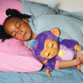 Fingerlings Care ‘n’ Cuddles Interactive Baby Monkey, side angle