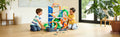 Hot Wheels City Ultimate T-Rex Garage Playset with 2 die-cast cars close up detail