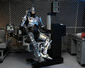 Robocop Battle Damaged Robocop With Chair Ultimate 7" Scale Action Figure (view 2)