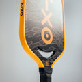 Aixo P14C Reaper Series Tiger King 18K Raw Carbon Pickleball Padel, in display