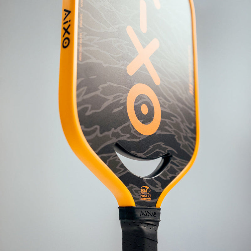 Aixo P14C Reaper Series Tiger King 18K Raw Carbon Pickleball Padel, in display