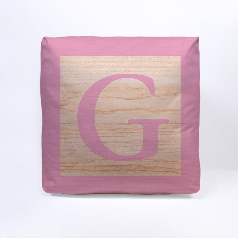 Pink Initial Baby Block Cube Cushion - 10, in display