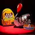 Loungefly - IT Pennywise Raincoat Cosplay Glow Mini Backpack side angle