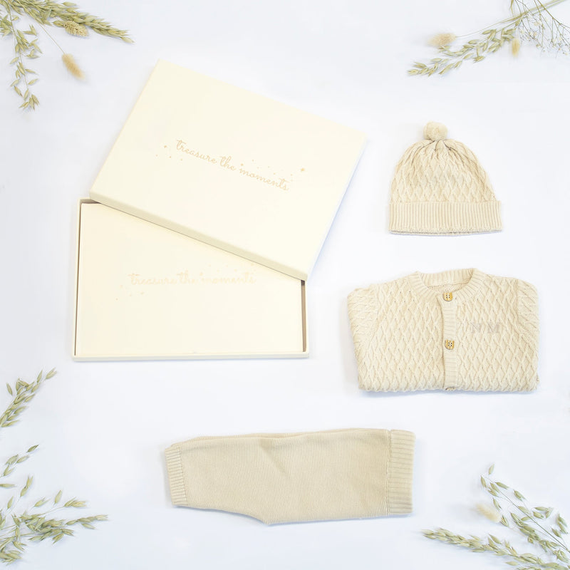 MY FIRST OUTFIT AND MEMORY BOOK collectible from The Baby Gifting Company
