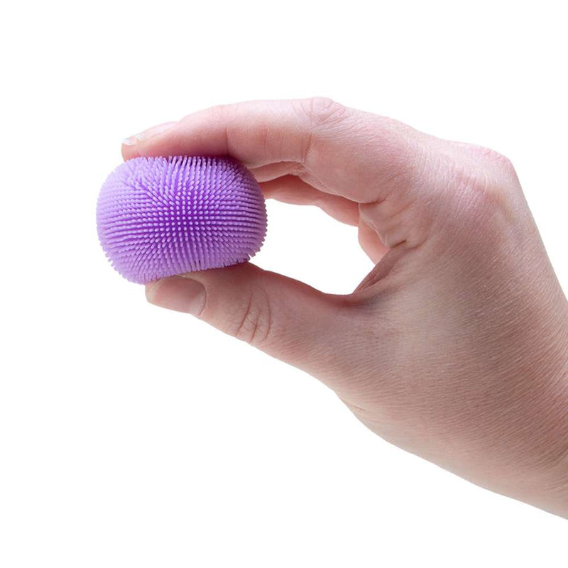 NeeDoh Teenie Fuzz Ball Mini Fuzzy Squishy in hand view