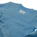 Manchester City FC Sleepsuit 12/18 mths ES, side angle
