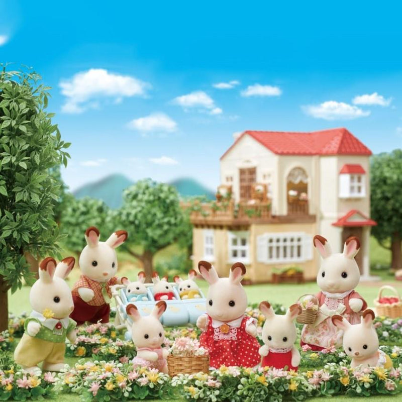 Sylvanian Families Chocolate Rabbit Family Toy Playset for Ages 3 & Up, in display