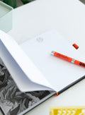 Dragon Ball Super Goku A5 Premium Notebook with Projector Pen design detail