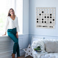 White Four in a Row Wall Game, in display