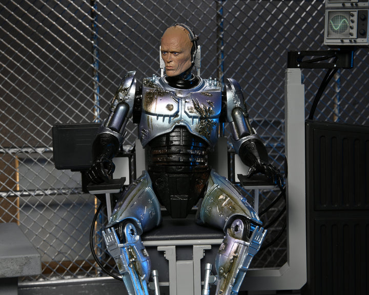 NECA Robocop 7” Scale Ultimate Battle Damaged RoboCop with Chair Action Figure